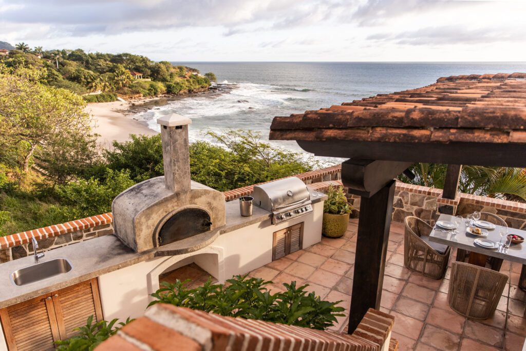 Overhead view of Casa del Sol's porch with grille at Rancho Santana surf resort.